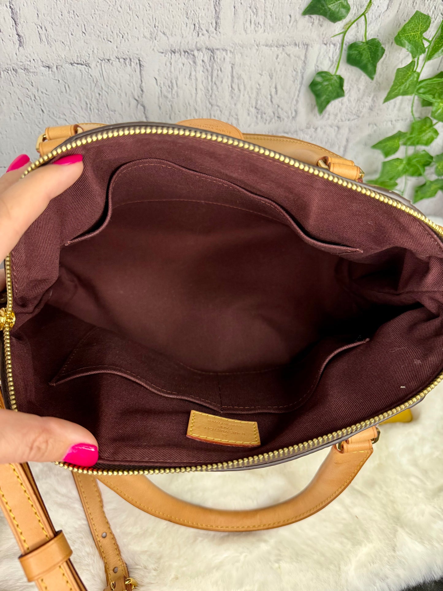 Louis Vuitton Monogram Rivoli MM