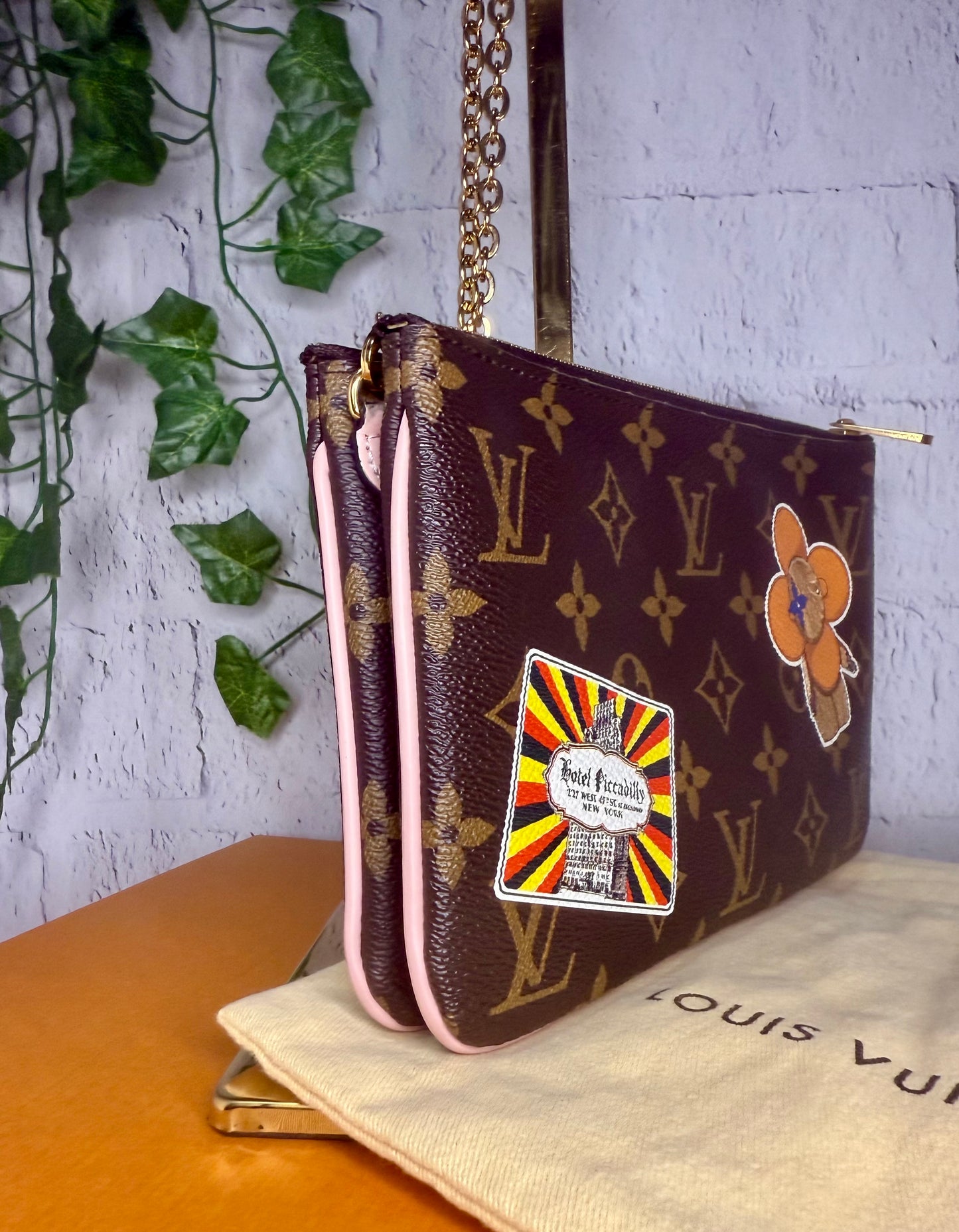 Louis Vuitton LIMITED EDITION World Tour Double Zip Pochette
