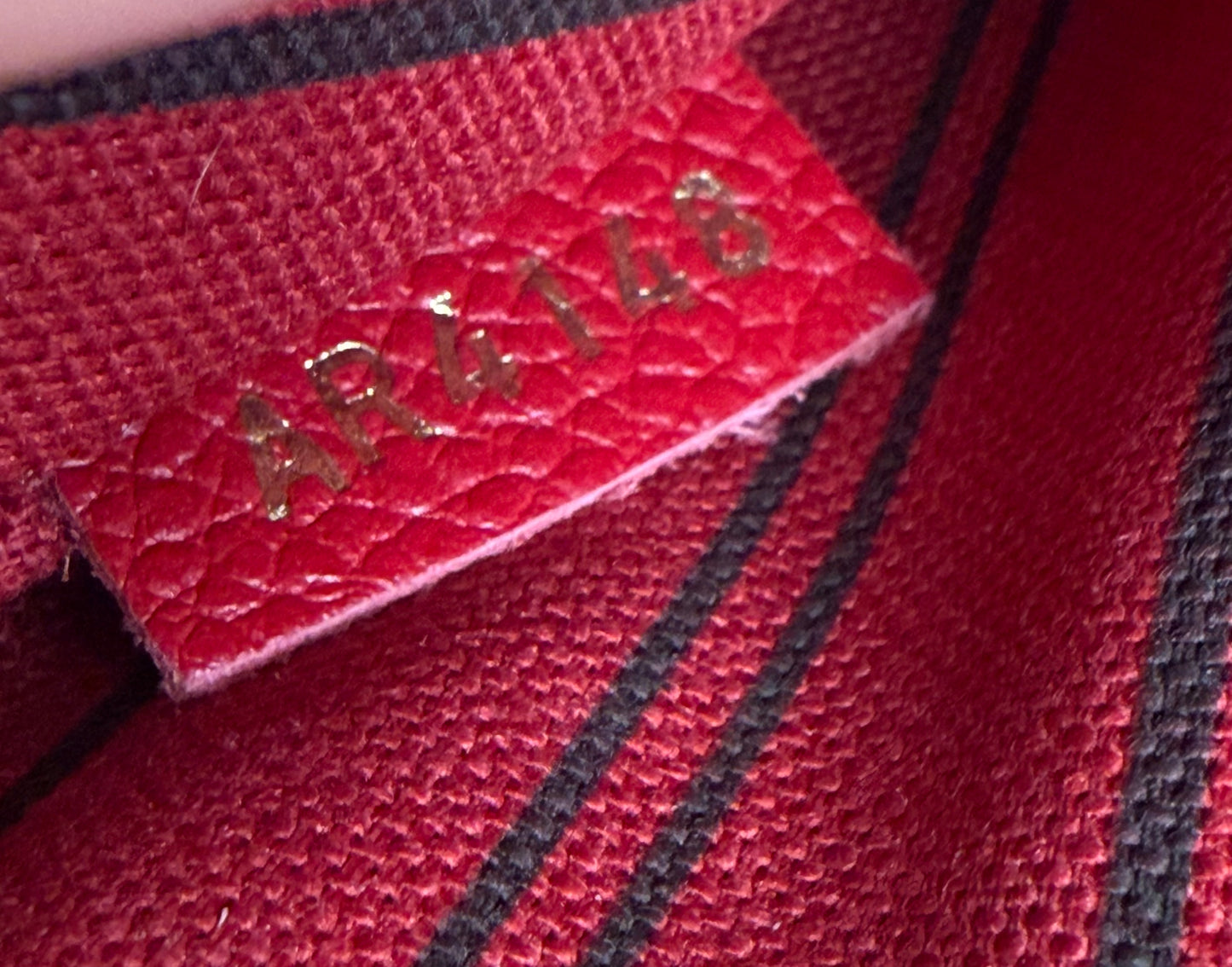 Louis Vuitton Cerise Empreinte Leather Pochette Métis