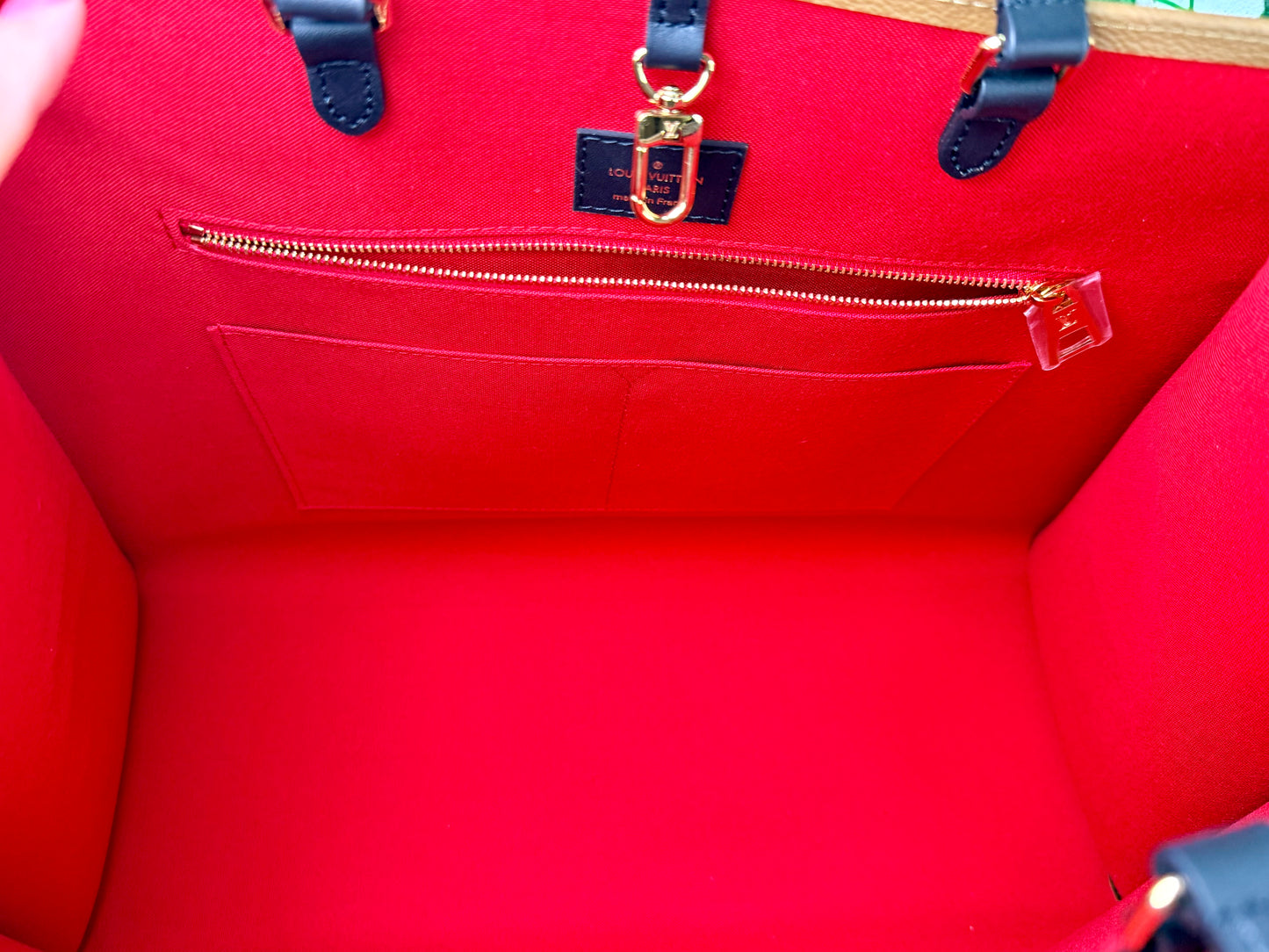 Louis Vuitton On The Go GM (Monogram Reverse)