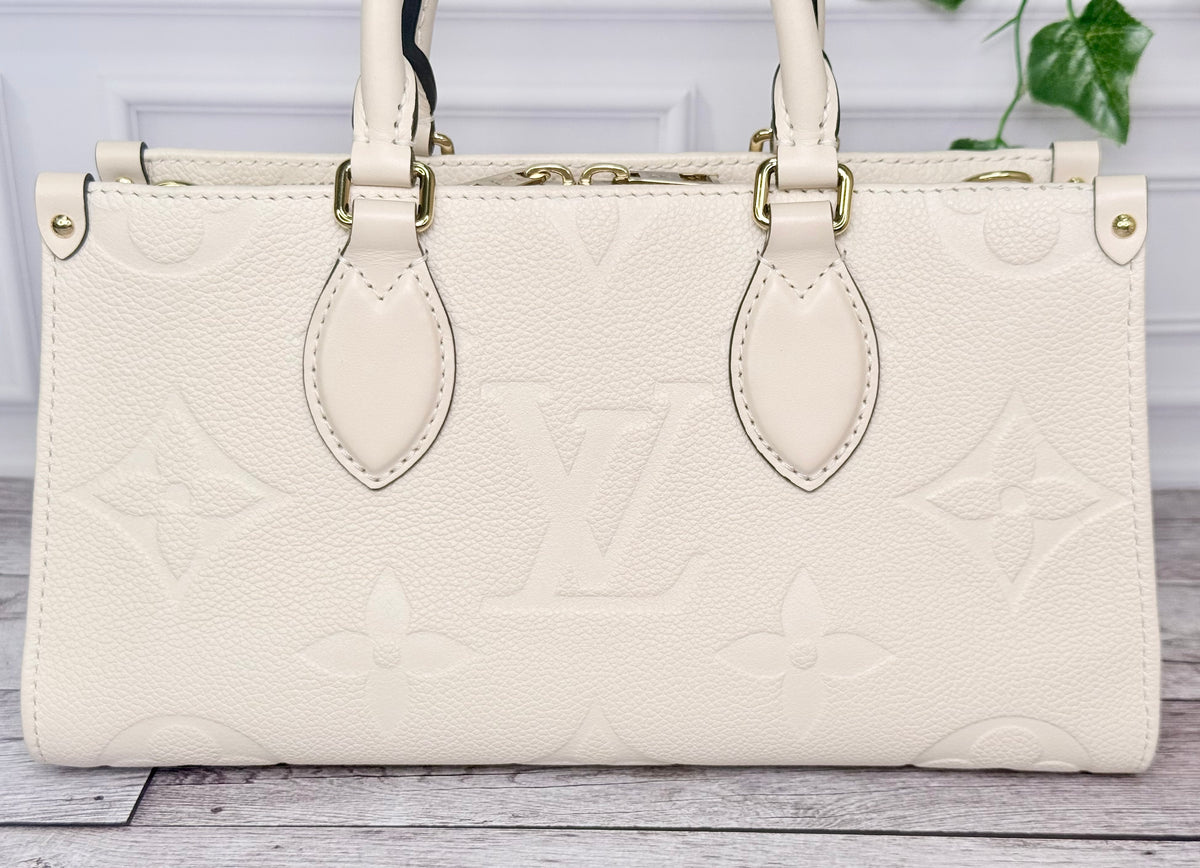 Louis Vuitton Empreinte Leather On The Go East West (Cream) - Like New