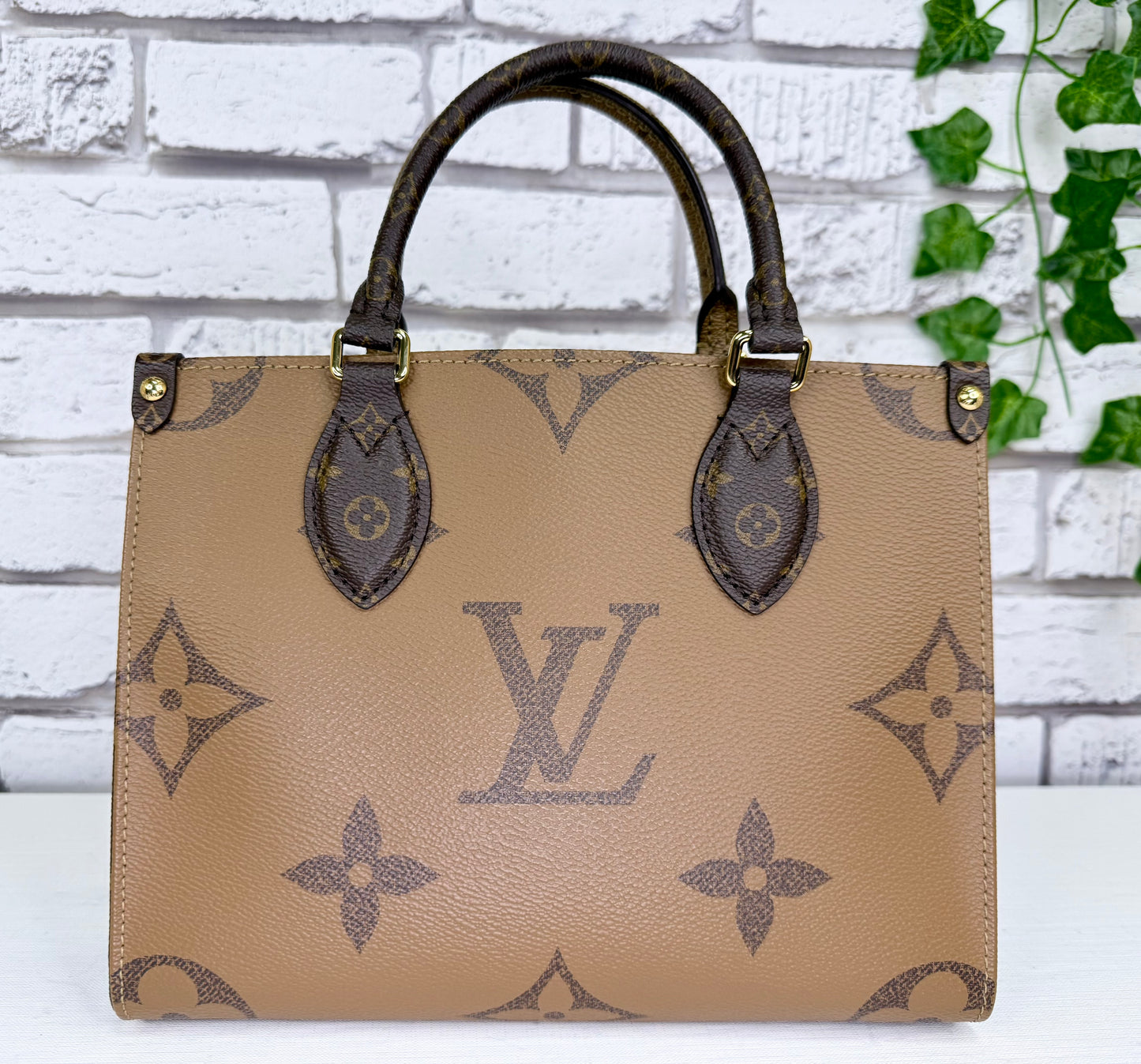 Louis Vuitton On The Go PM (Reverse Monogram) - Like New