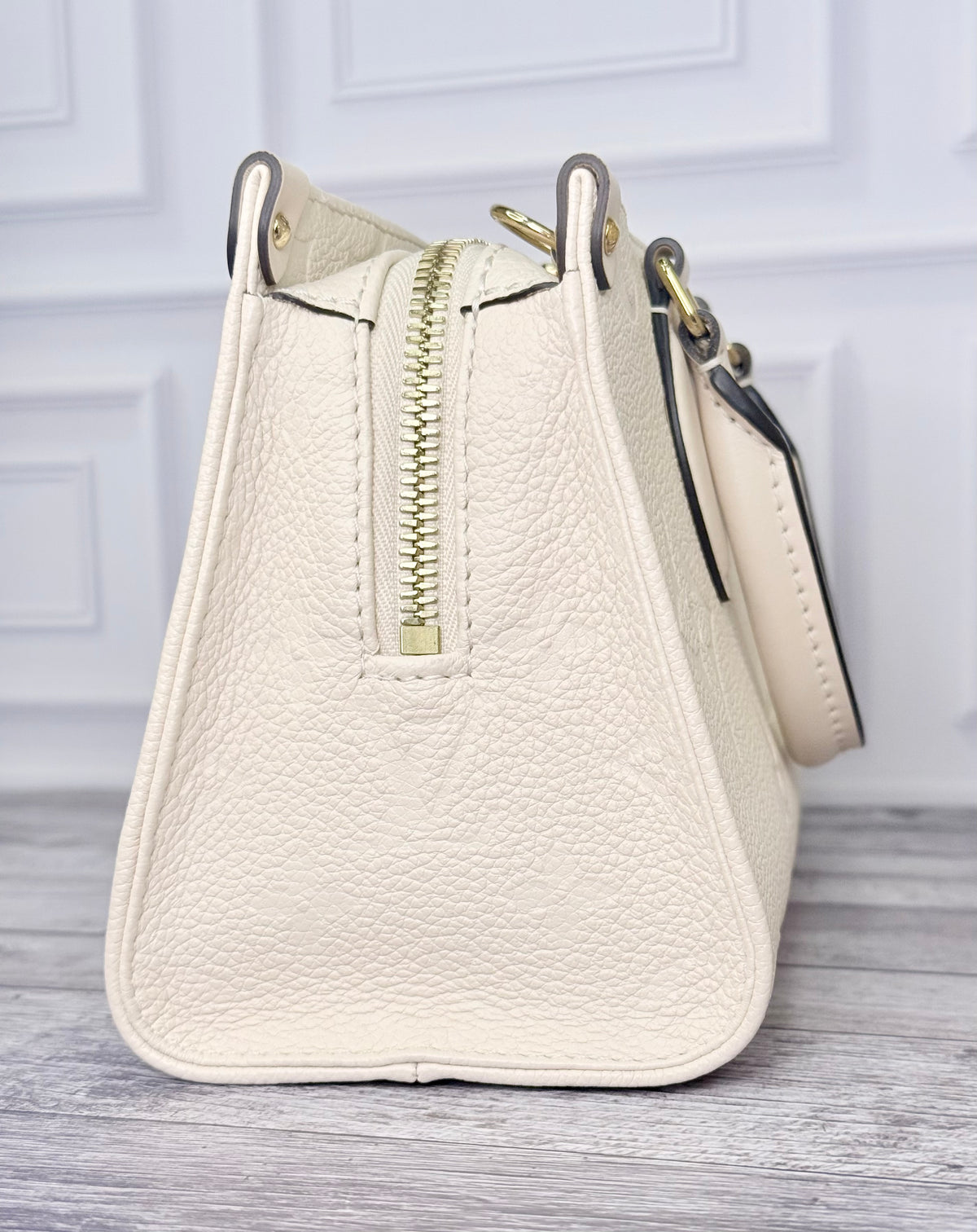 Louis Vuitton Empreinte Leather On The Go East West (Cream) - Like New
