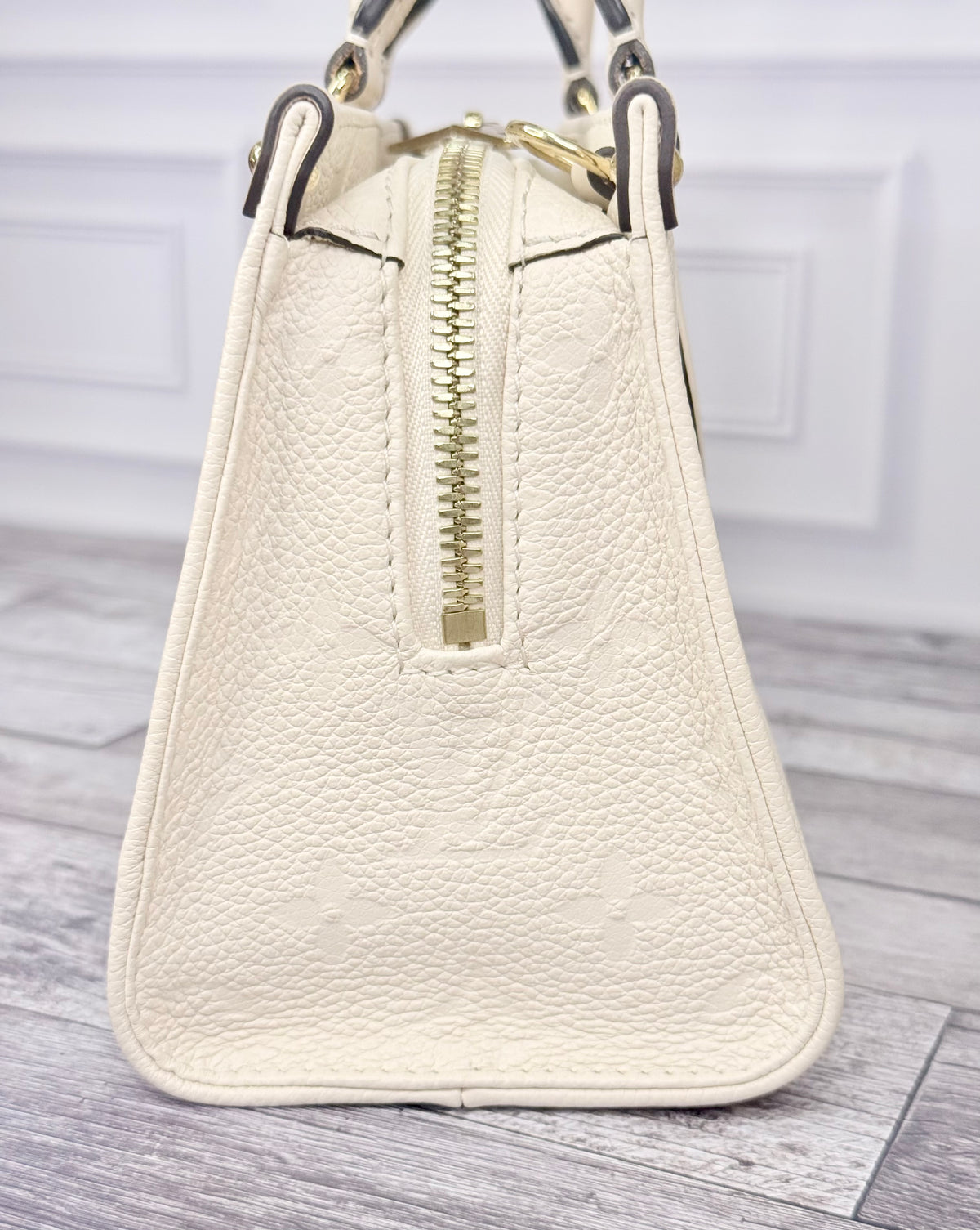 Louis Vuitton Empreinte Leather On The Go East West (Cream) - Like New