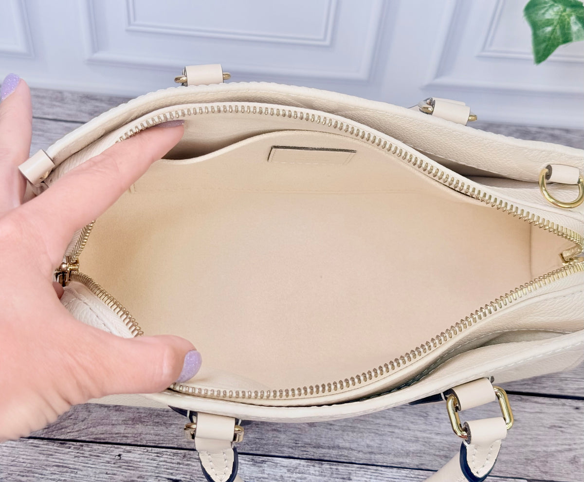 Louis Vuitton Empreinte Leather On The Go East West (Cream) - Like New