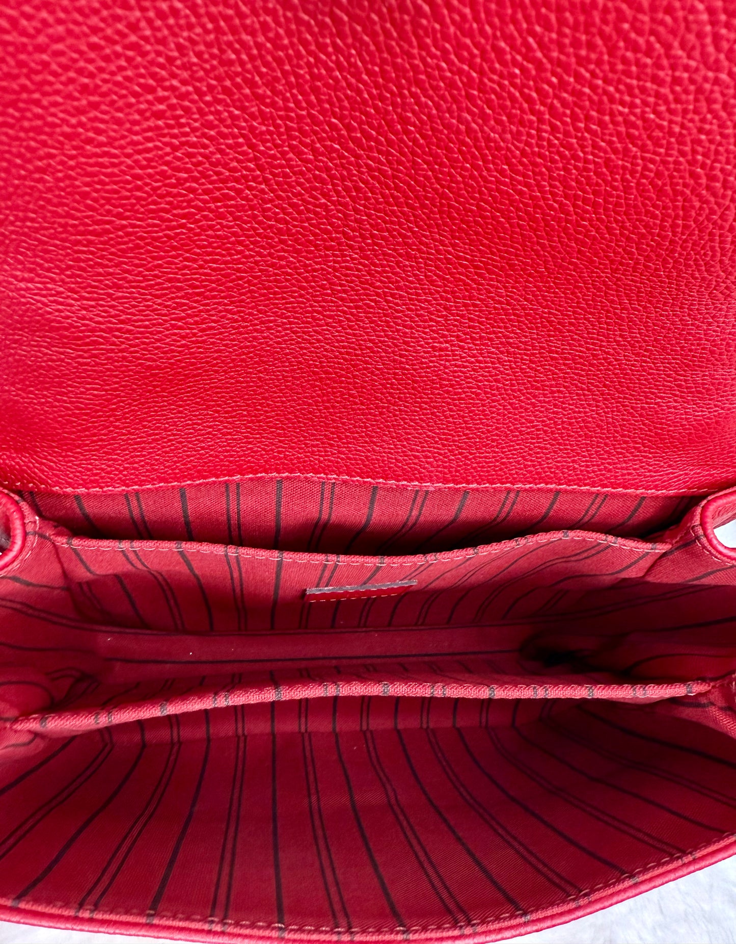 Louis Vuitton Cerise Empreinte Leather Pochette Métis