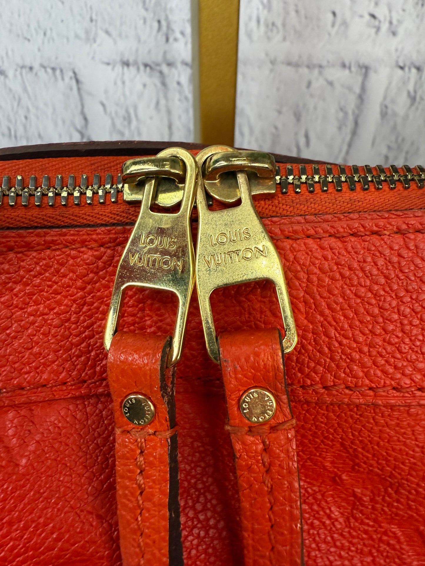 Louis Vuitton Empreinte Leather Bastille (Cerise)