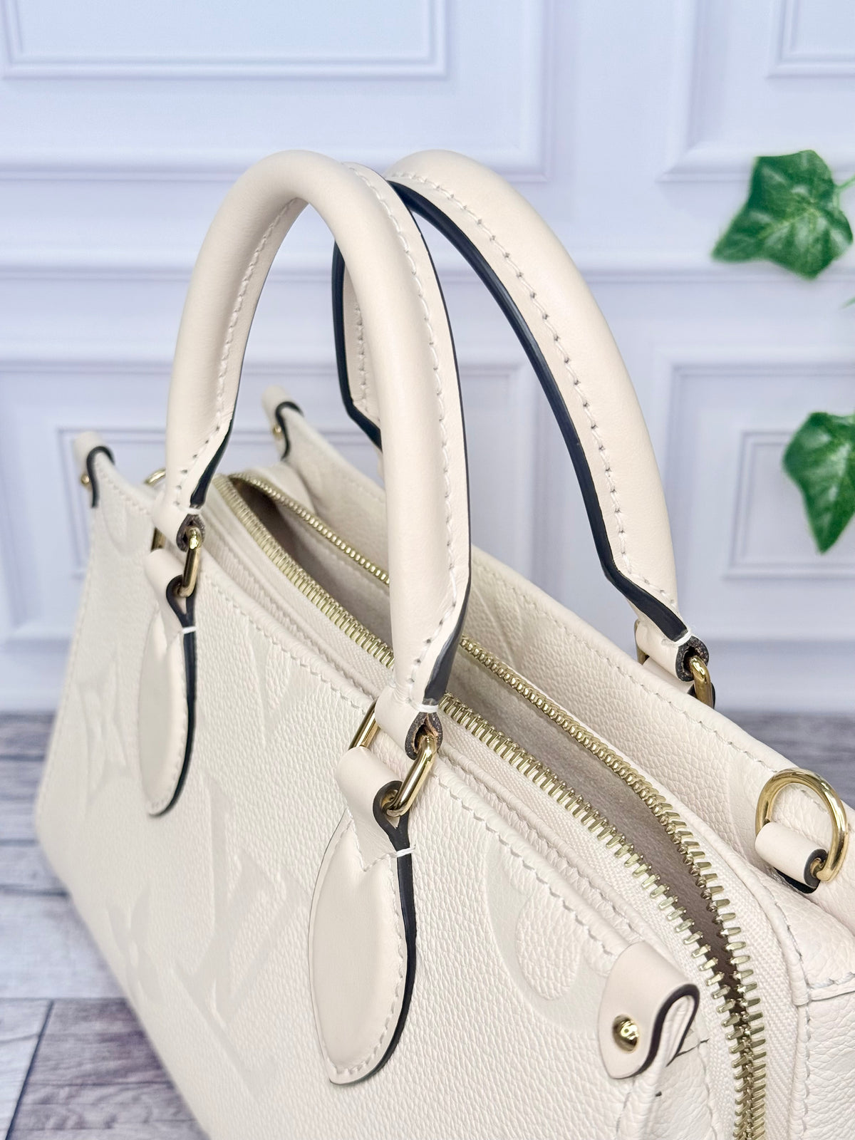 Louis Vuitton Empreinte Leather On The Go East West (Cream) - Like New