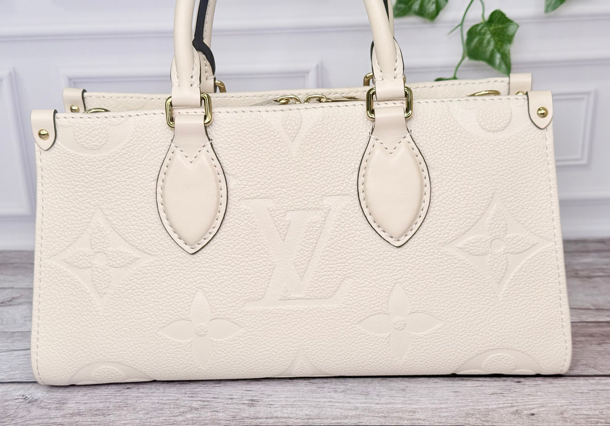 Louis Vuitton Empreinte Leather On The Go East West (Cream) - Like New